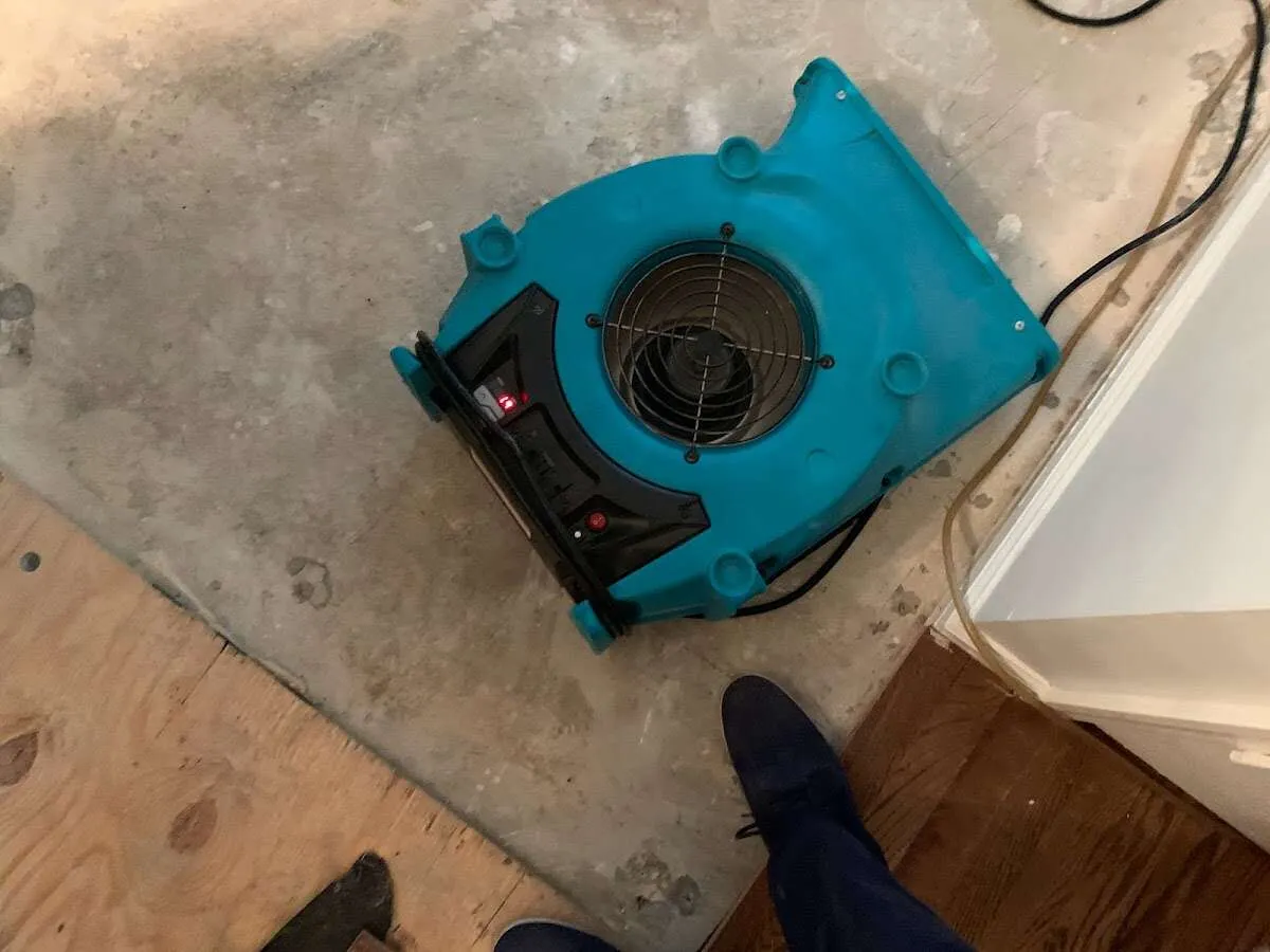 Air mover drying subfloor during Leak Detection & Repair in Tuba City