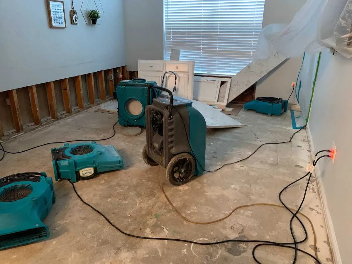 Dehumidifier in flood-cut room for Water Damage Restoration in Tuba City